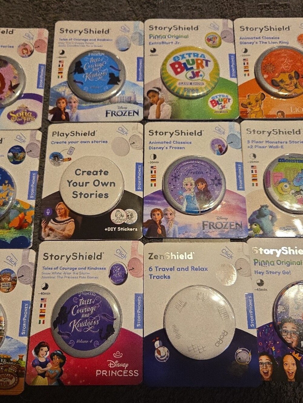 Lot of 12 StoryShield StoryPhones Disney Themed Kids Audio Players - Multicolor